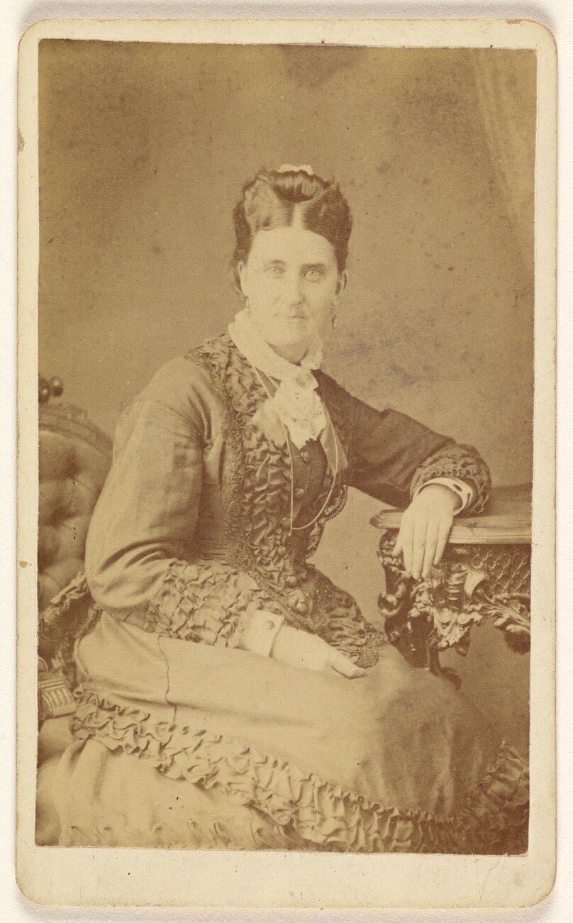 [Woman, seated]