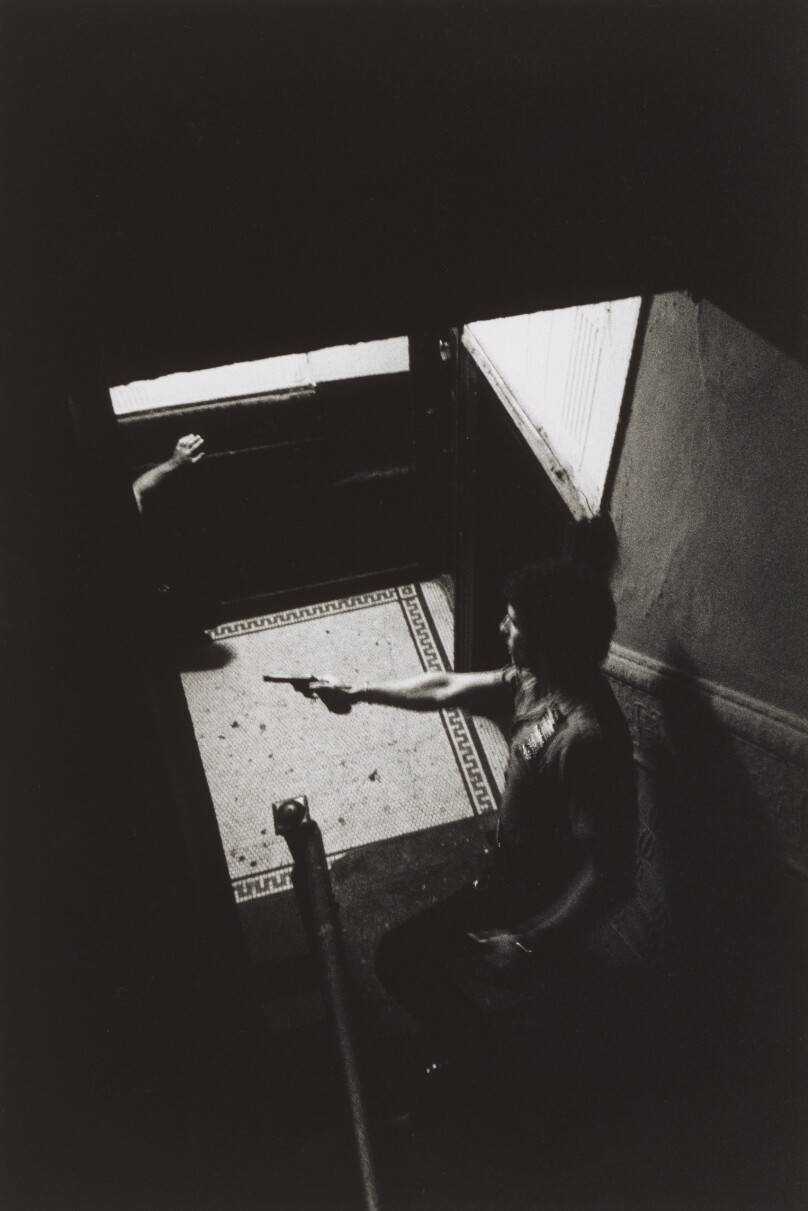 Gun on Staircase