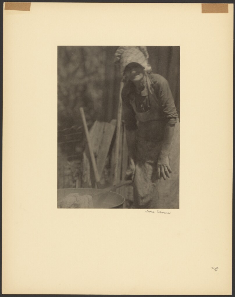 [Woman in Bonnet, Bending Over Tub]