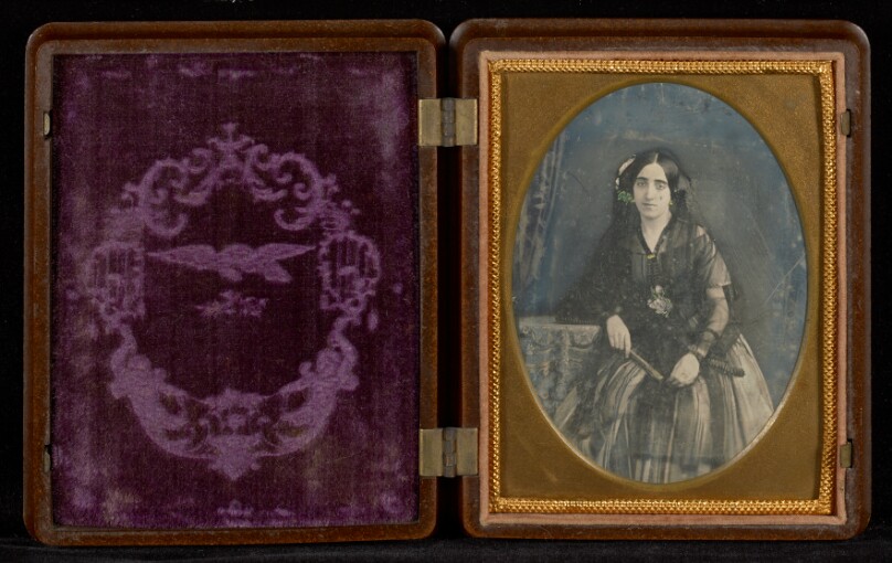 [Portrait of Woman in Black with Fan]