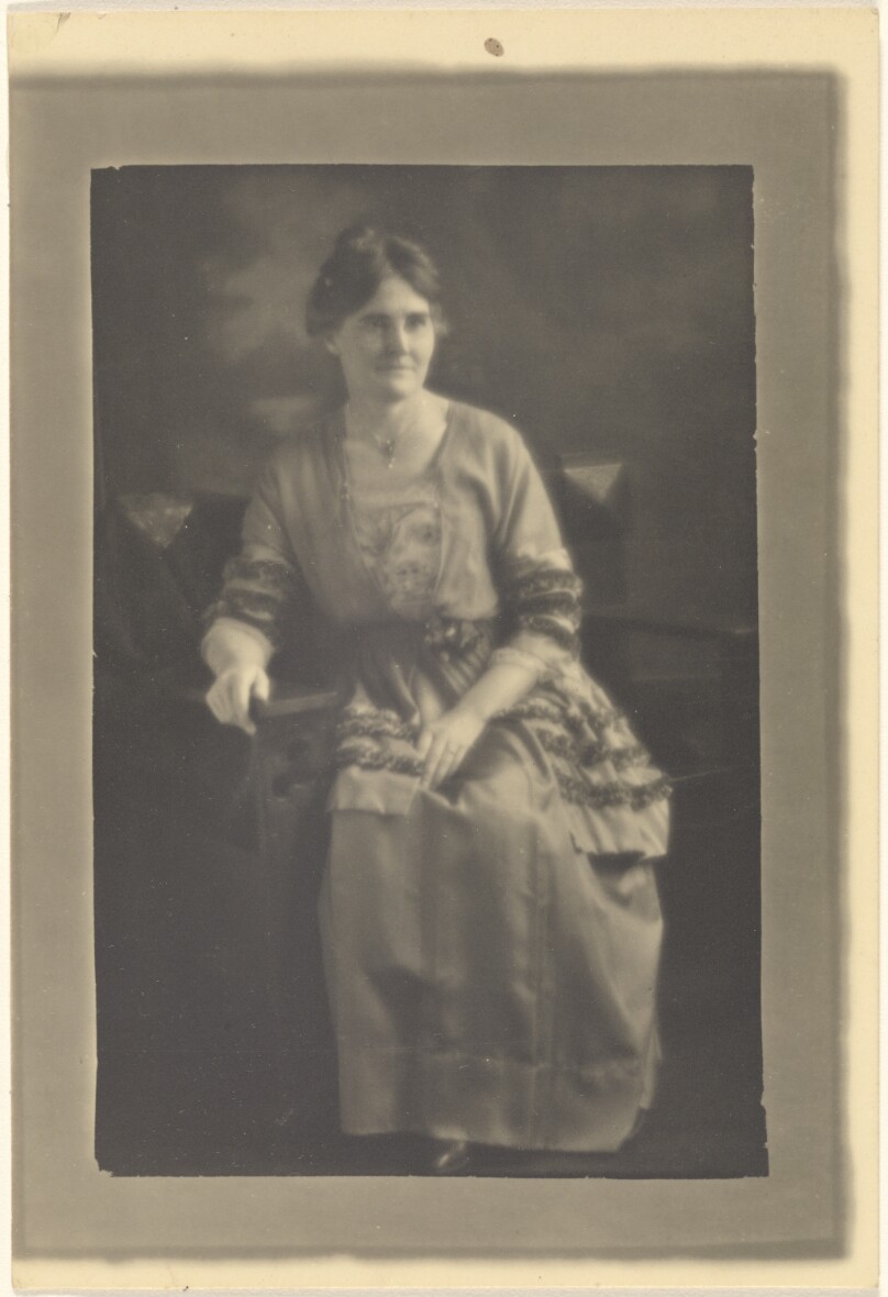 [Portrait of a Seated Woman in Dress with Ribbon Accents]