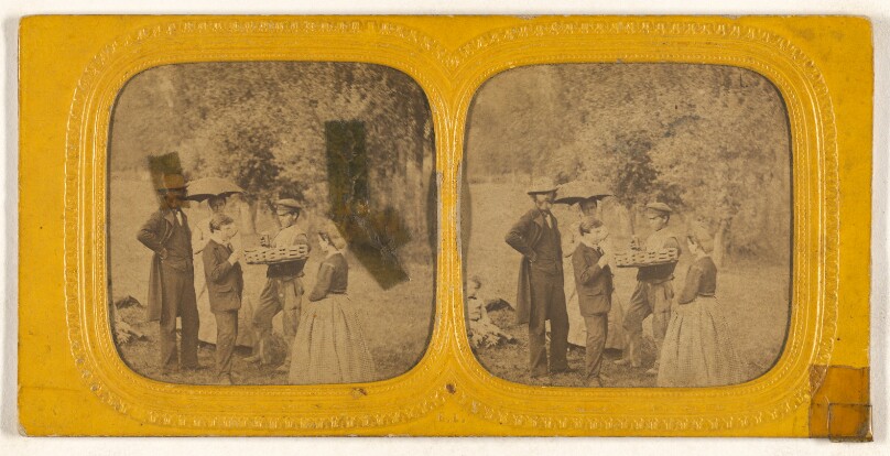 [Family portrait at a picnic]