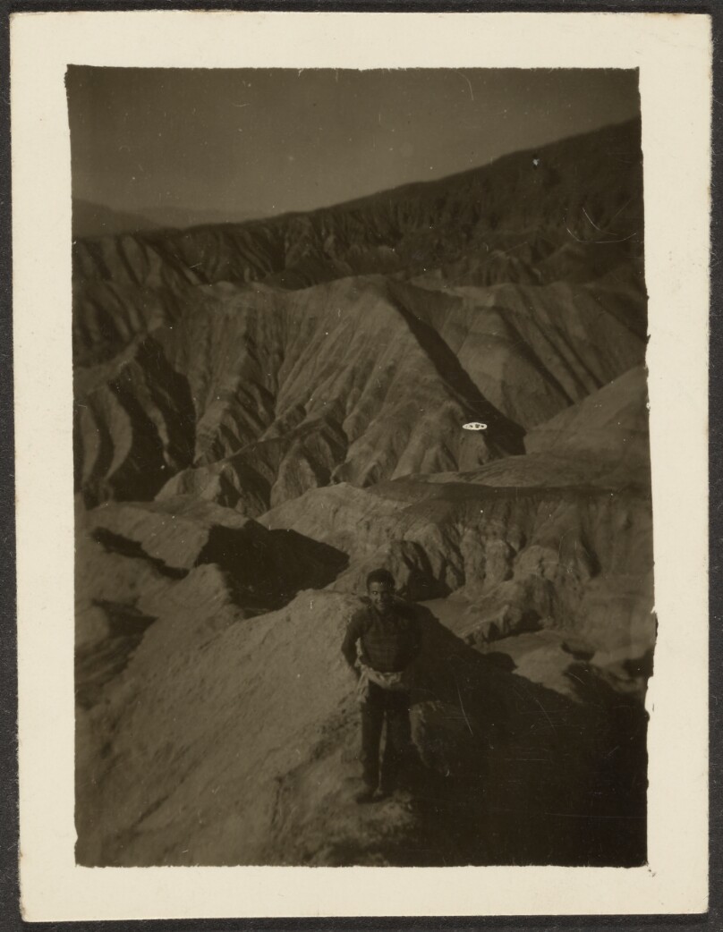 [Figure in Rocky Desert Landscape]