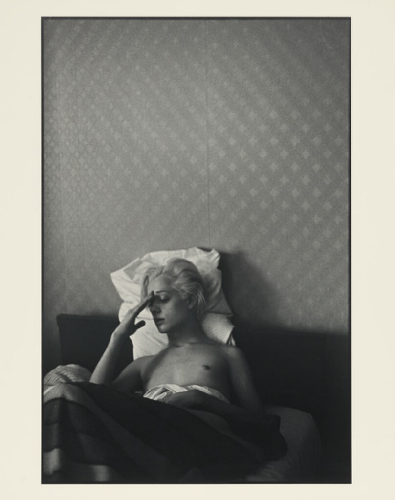 Transwoman in Her Hotel Room, The Queen