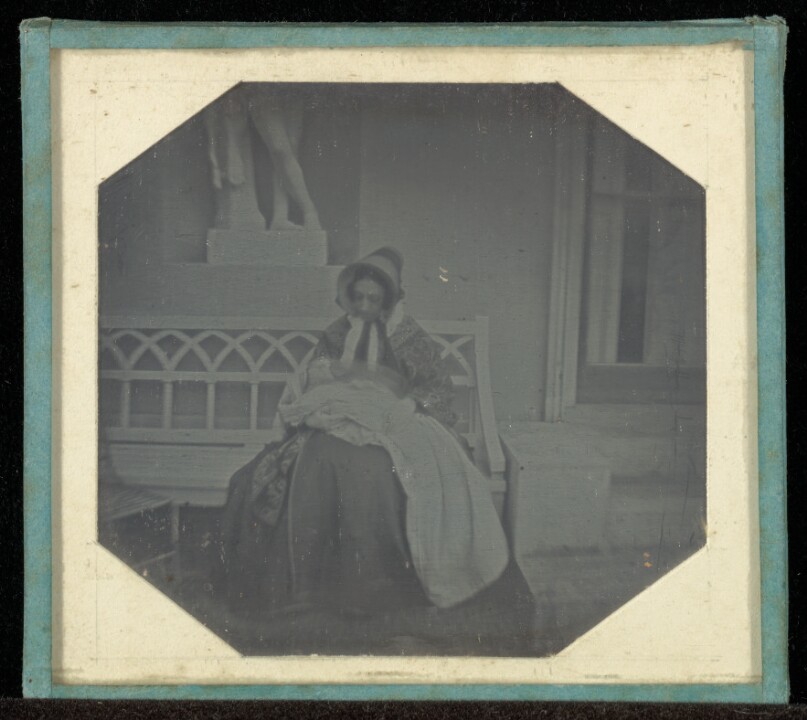 [Portrait of a woman with a baby]