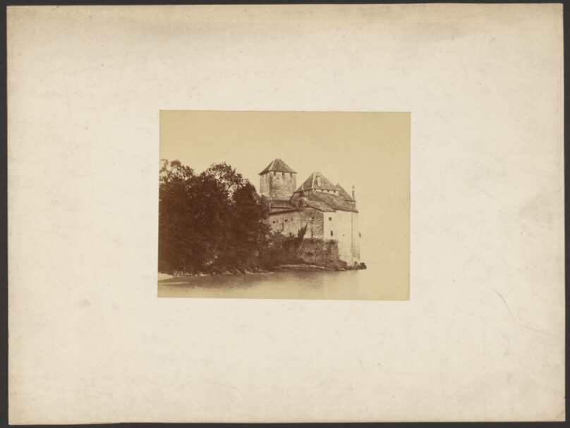 [Stone building on edge of lake]