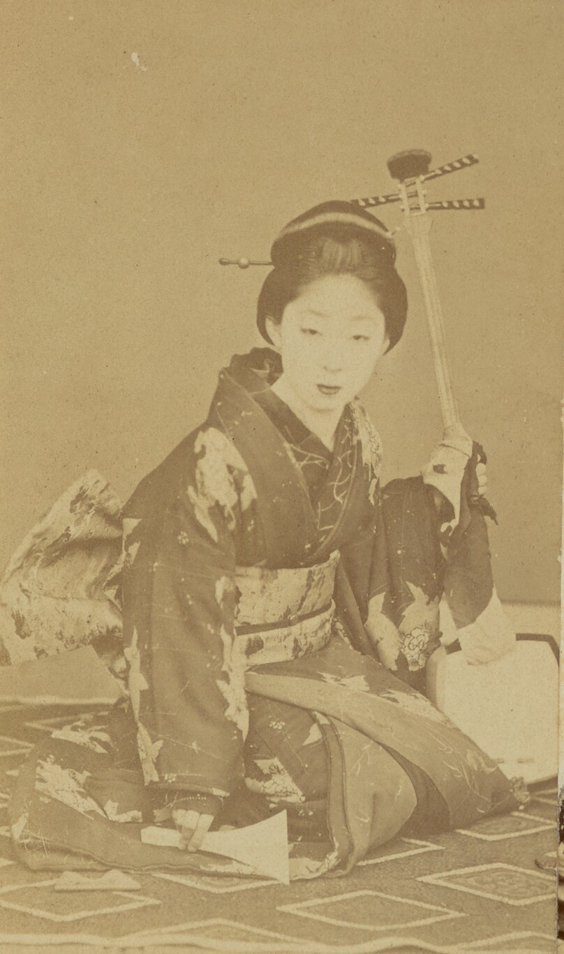 [Kneeling Japanese Woman]