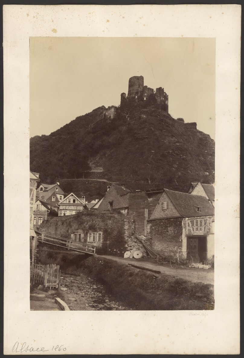 [Ruins of castle overlooking town]
