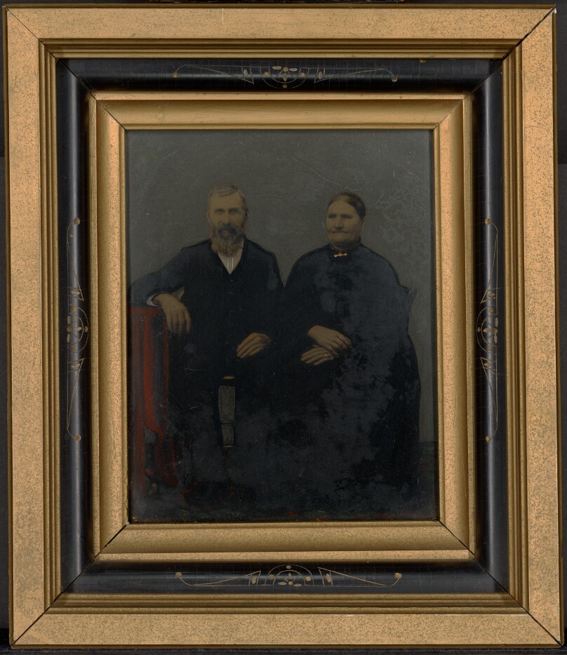 [Portrait of seated couple]