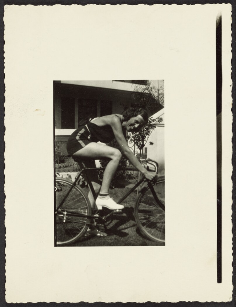 [Woman on racing bicycle]