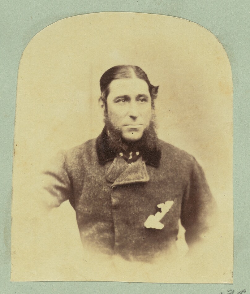 [Portrait of man with long sideburns]