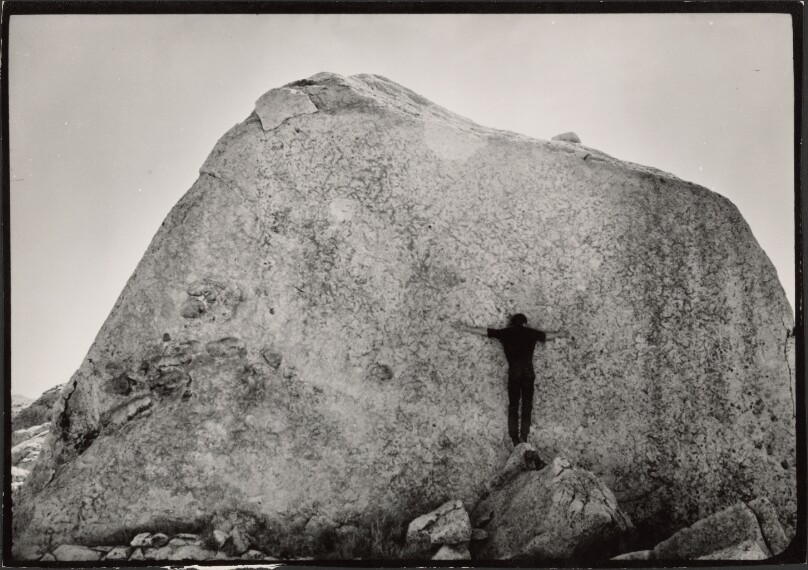Michael Heizer measuring a rock in the desert, North Las Vegas, Nevada