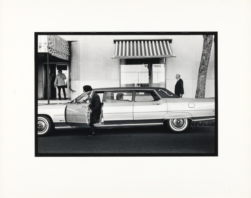 [Driver Getting into Limousine]