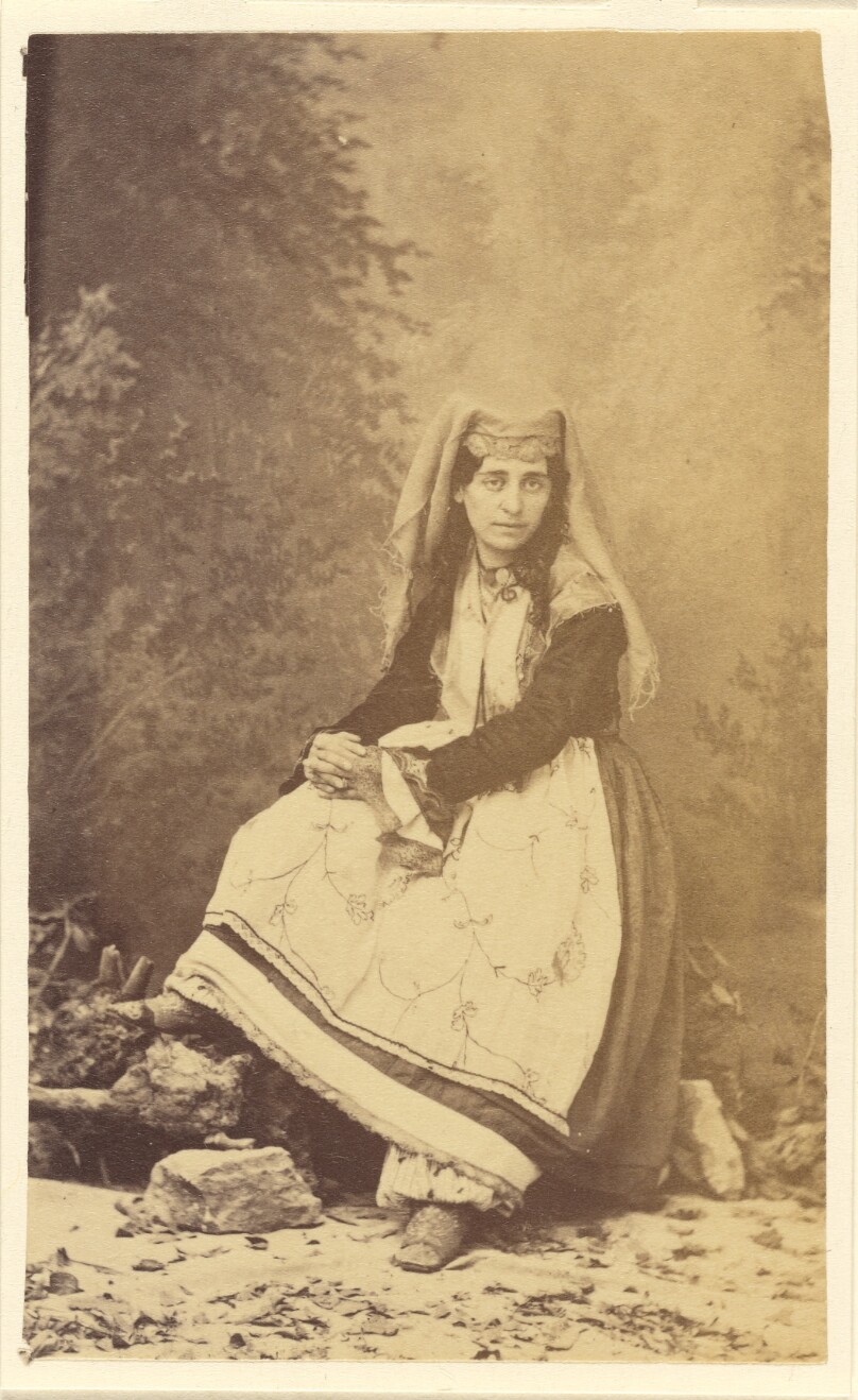 Type Cretin. [Seated woman in local costume].