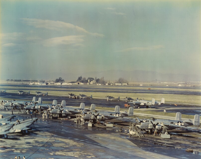 Planes On Field (P-38s ?)
