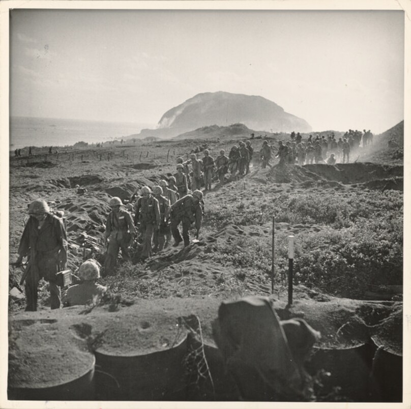 American Marines on the march during battle against Japanese for Iwo Jima during WWII