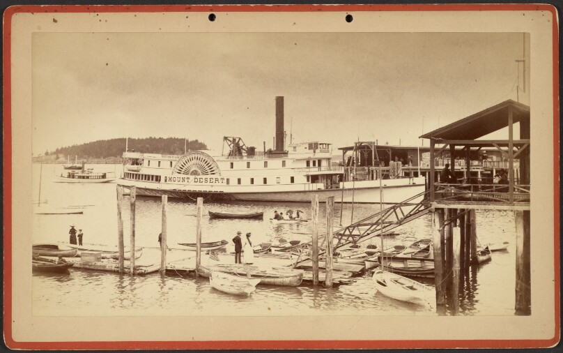 [Dock scene: people on rafts and/or in boats with "Mount Desert" paddleboat at center]