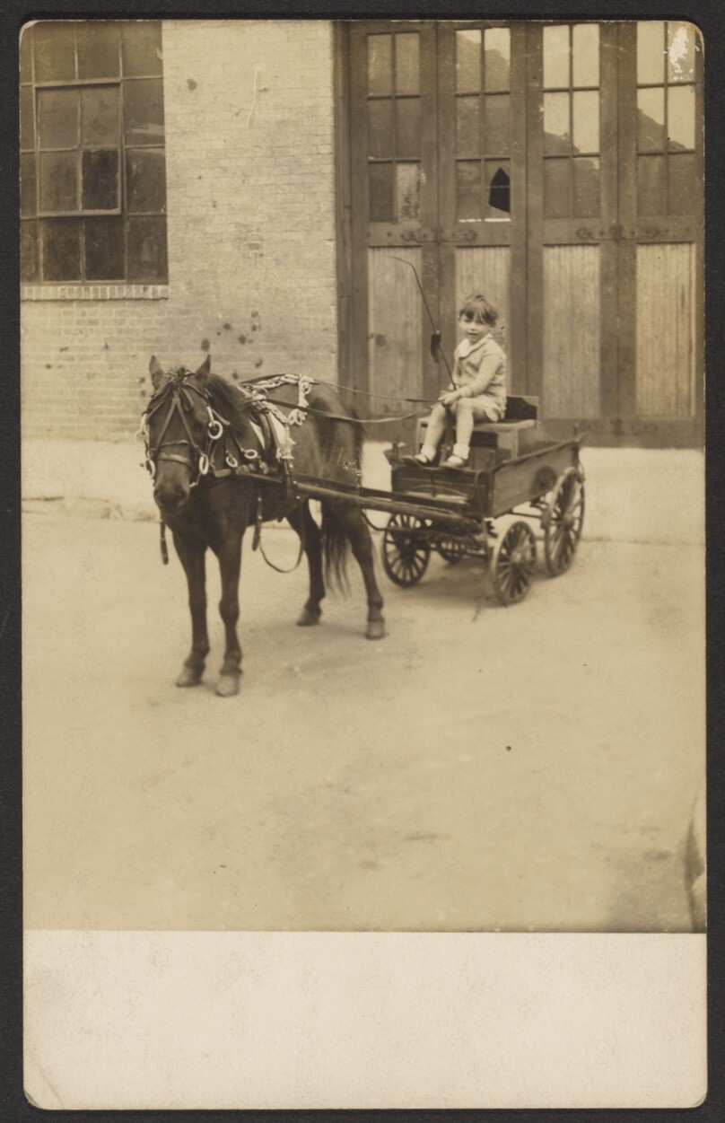 [Child with cart and horse]