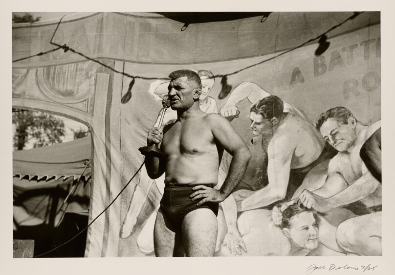 [Man with Microphone]