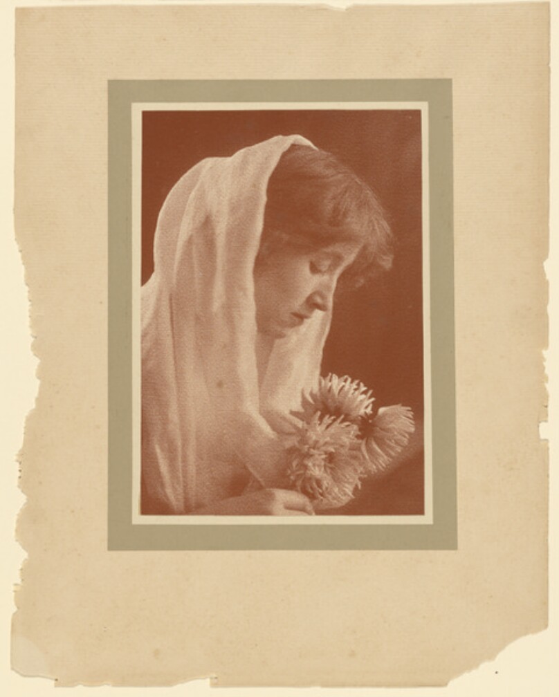[Portrait of woman with flowers]