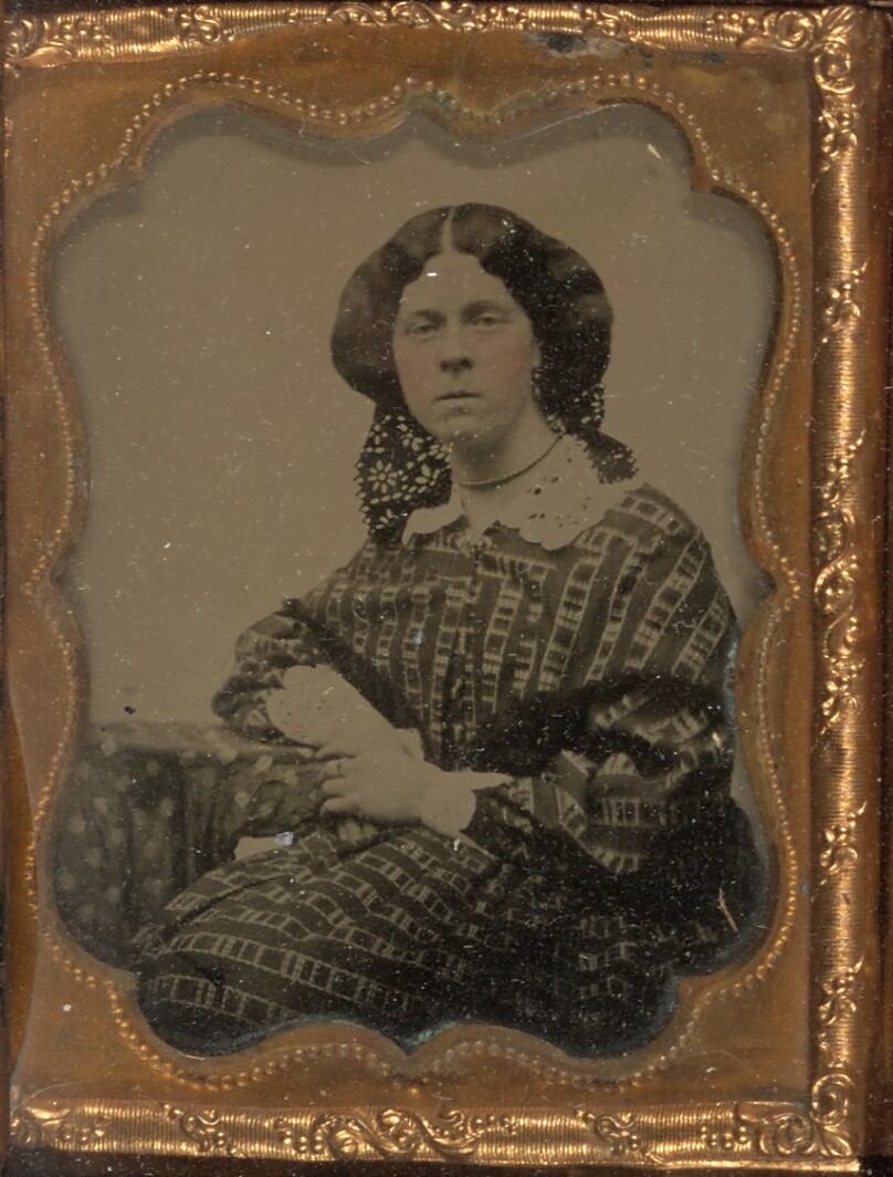 [Woman seated]