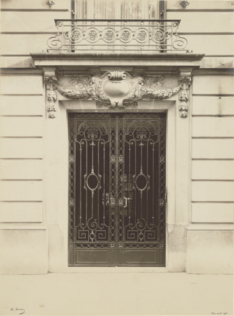 [Wrought-iron doors]