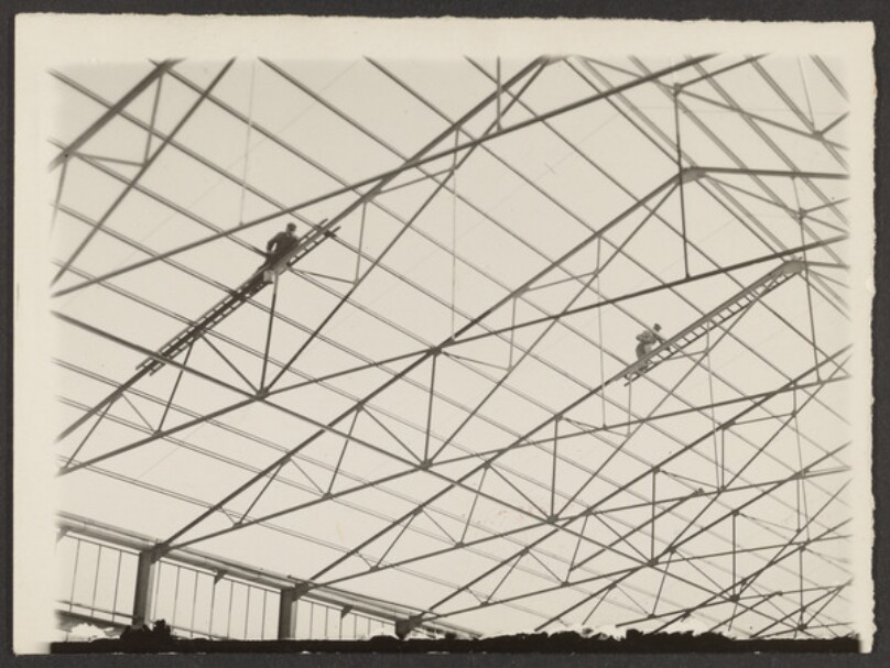 [Men on Roof Lattice]