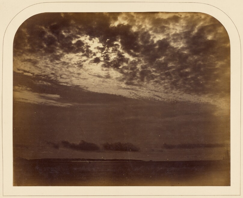 Moonlight struggling through the clouds