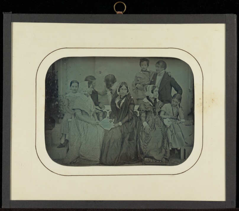 [Group portrait of nine Eynard-Lullin family members]