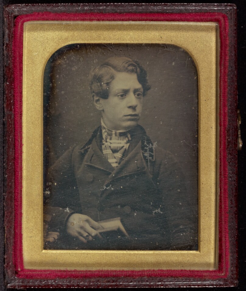 [Portrait of a Young Man Holding a Book]