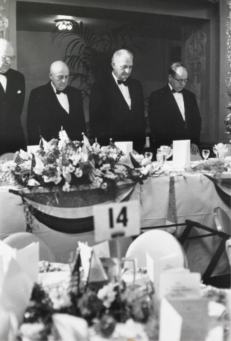 Prayer before dinner at the 50th anniversary of the fall of Battan and Corregidor. Washington Congressmen respect and fear the political power of the large war-veteran groups.