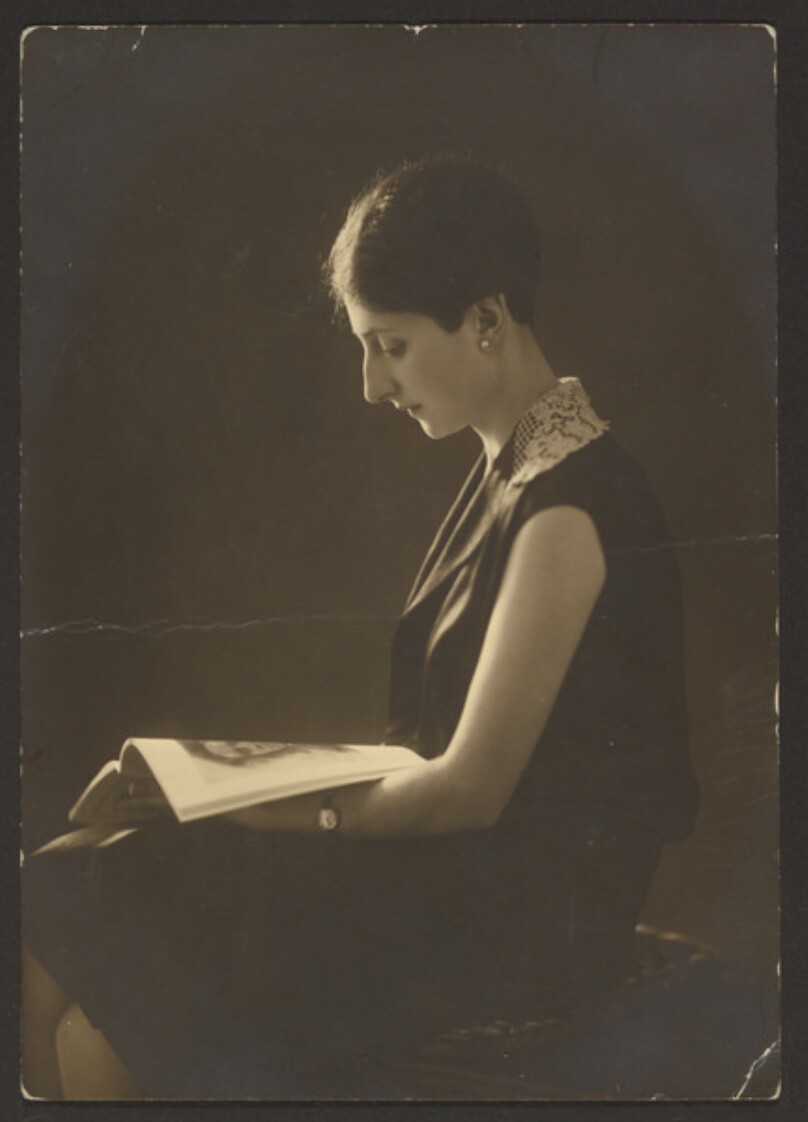 [Portrait of a woman reading]