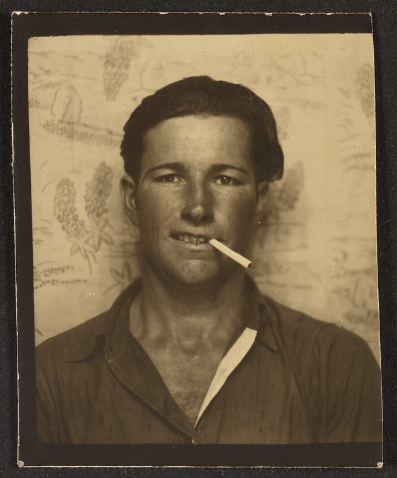 [Man smoking cigarette]