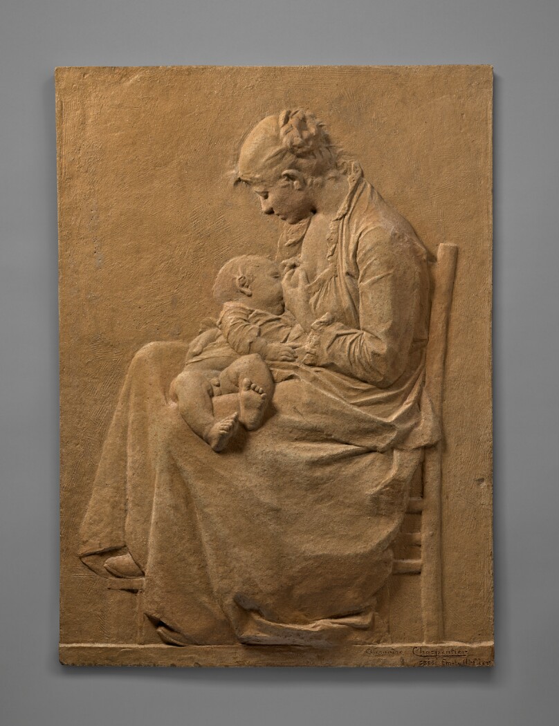 Young Mother Breastfeeding her Child