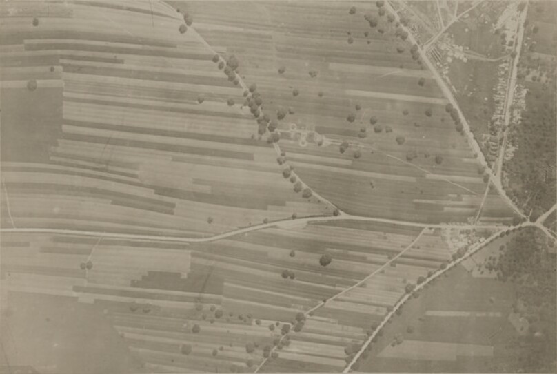 [Aerial View of a Field Being Bombed]