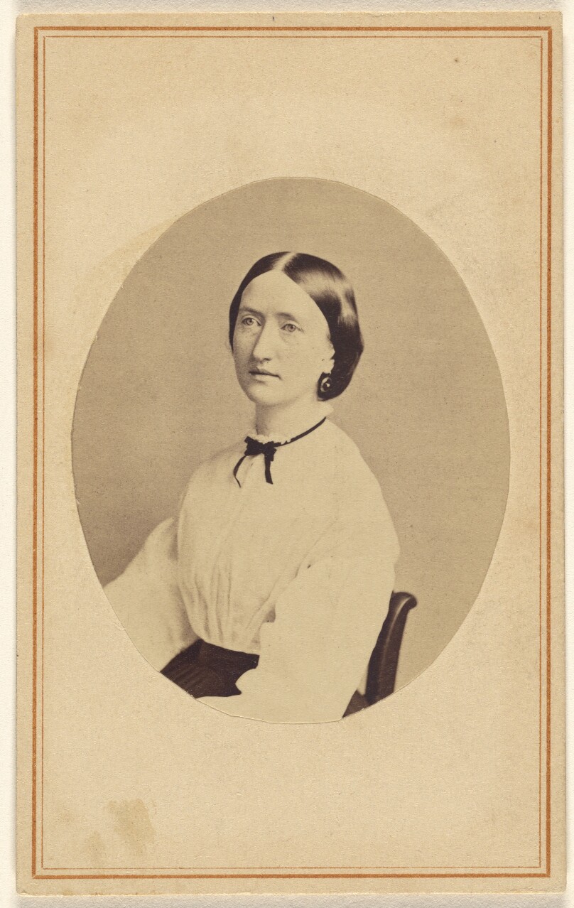 [Unidentified woman, seated]