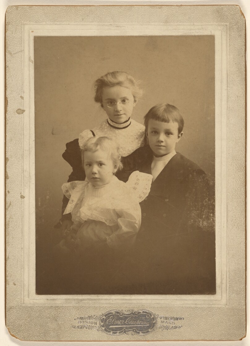 [Three children]