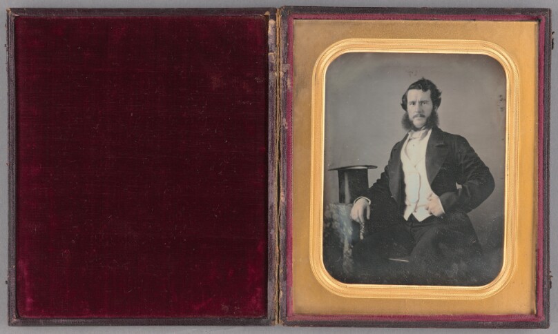 [Portrait of a man with muttonchop whiskers and moustache]