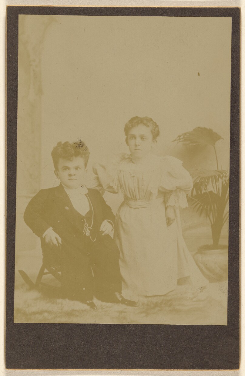 [Portrait of a male and female dwarf]
