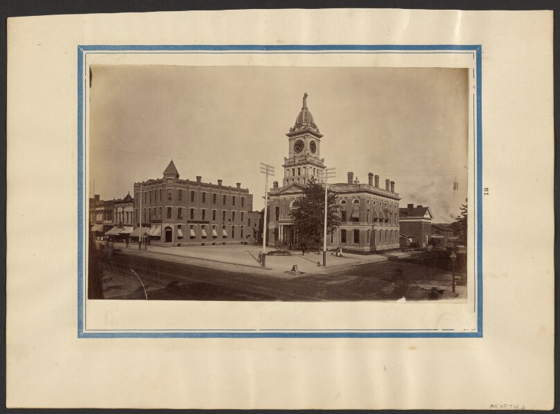 [Building with clock tower, Maple City]