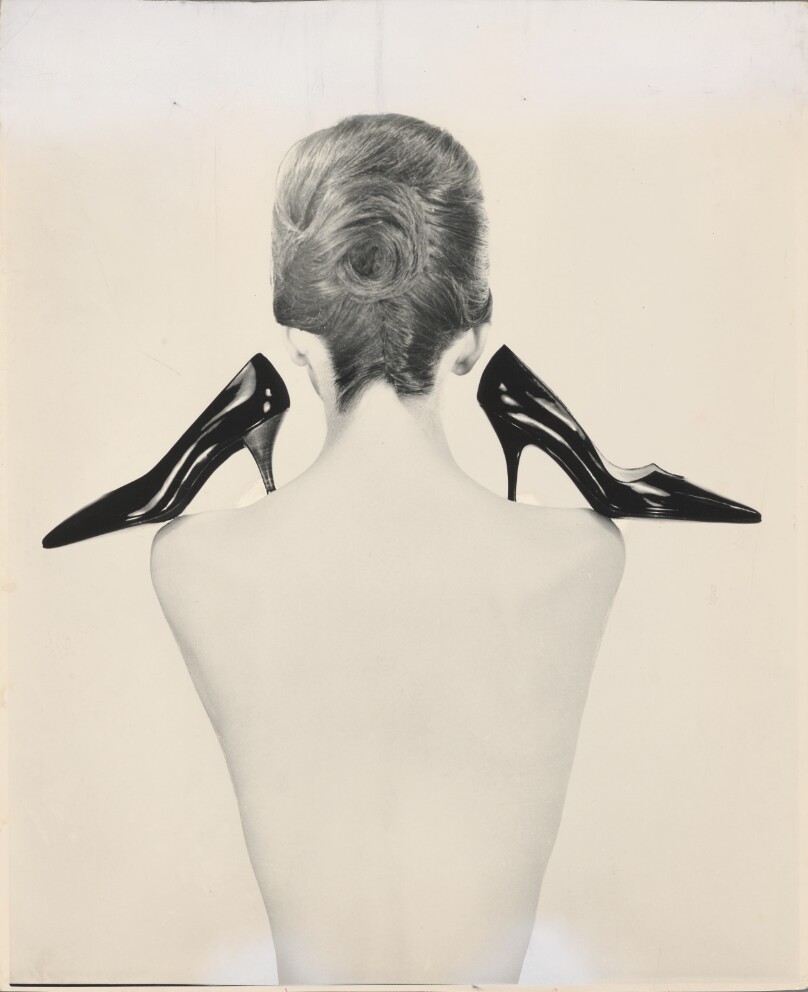 Model with Shoes on her Shoulders