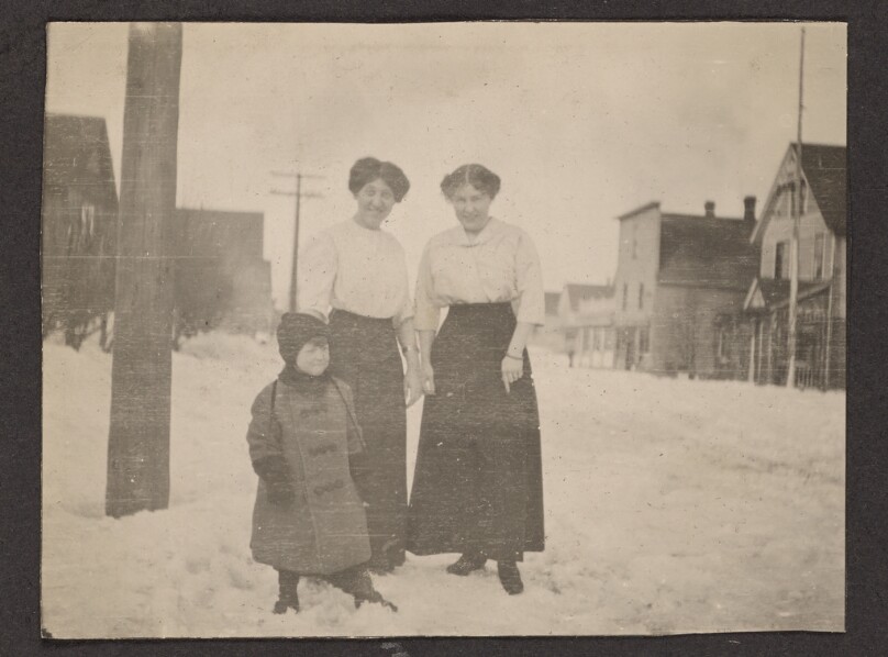 [Women and child in the snow]