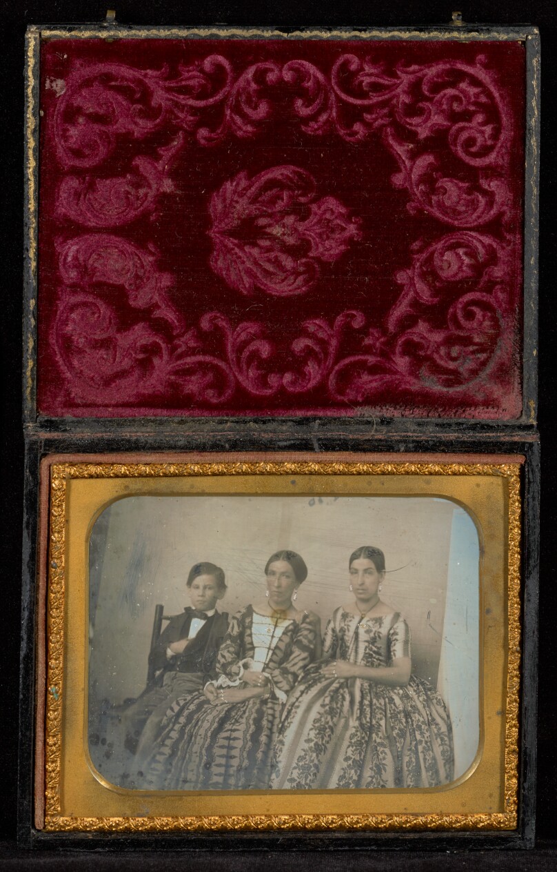 [Horizontal Portrait of Two Seated Women and a Boy]