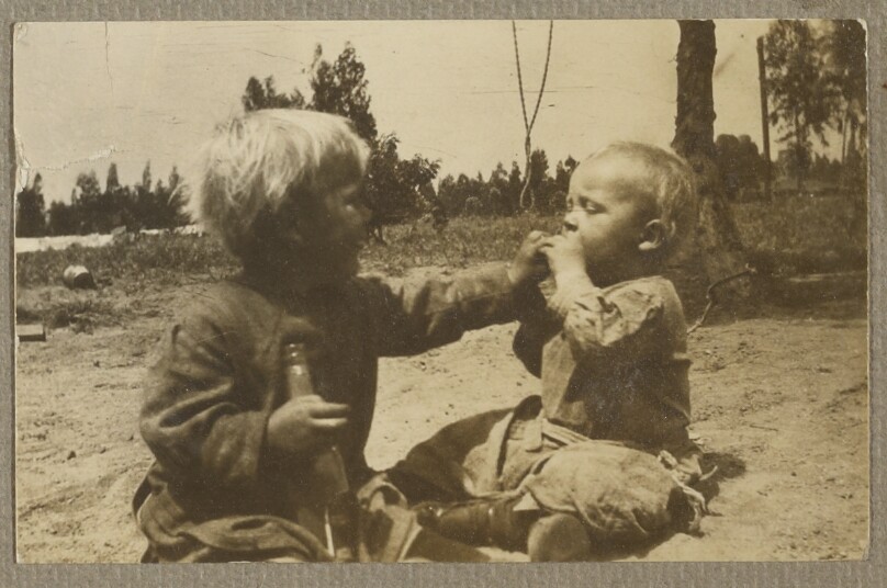 [Chandler Weston feeding a baby]