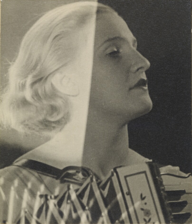 [Eva with Accordion]