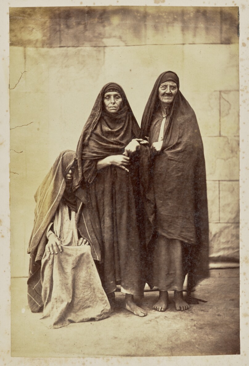 [Group portrait of three women]
