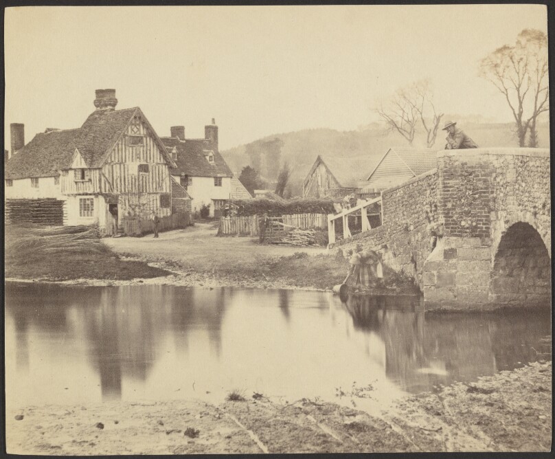 [View of a House across a River with a Bridge to the Right]