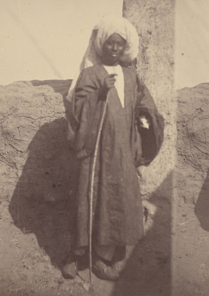 [Portrait of a Young North African Man Standing Against a Pillar]