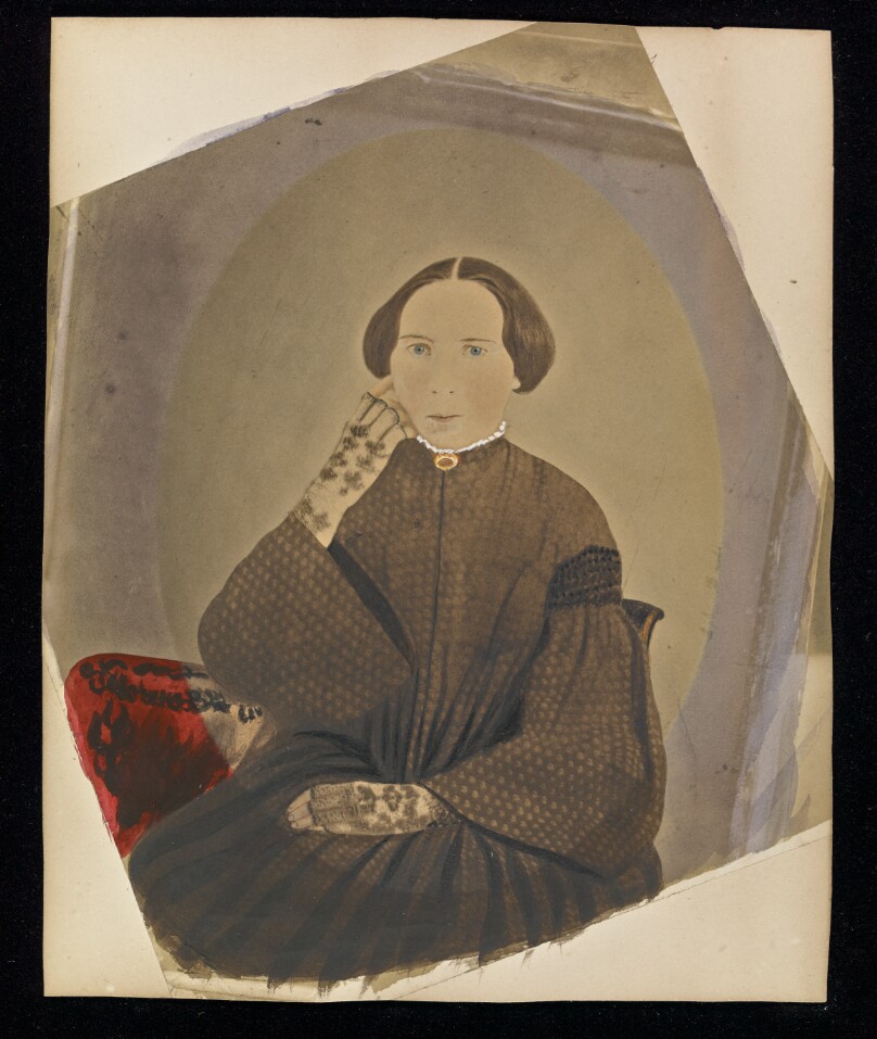 [Portrait of seated woman]