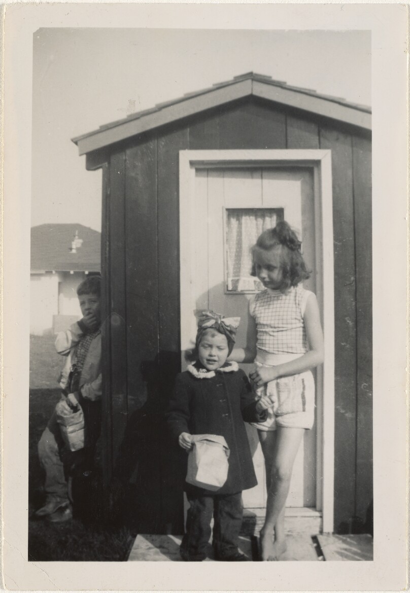 [Three children]